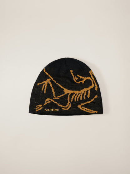 https://cdn.shopify.com/s/files/1/0696/2829/7281/files/F25-X000006756-Bird-Head-Toque-24K-Black-Front.jpg?v=1766232136